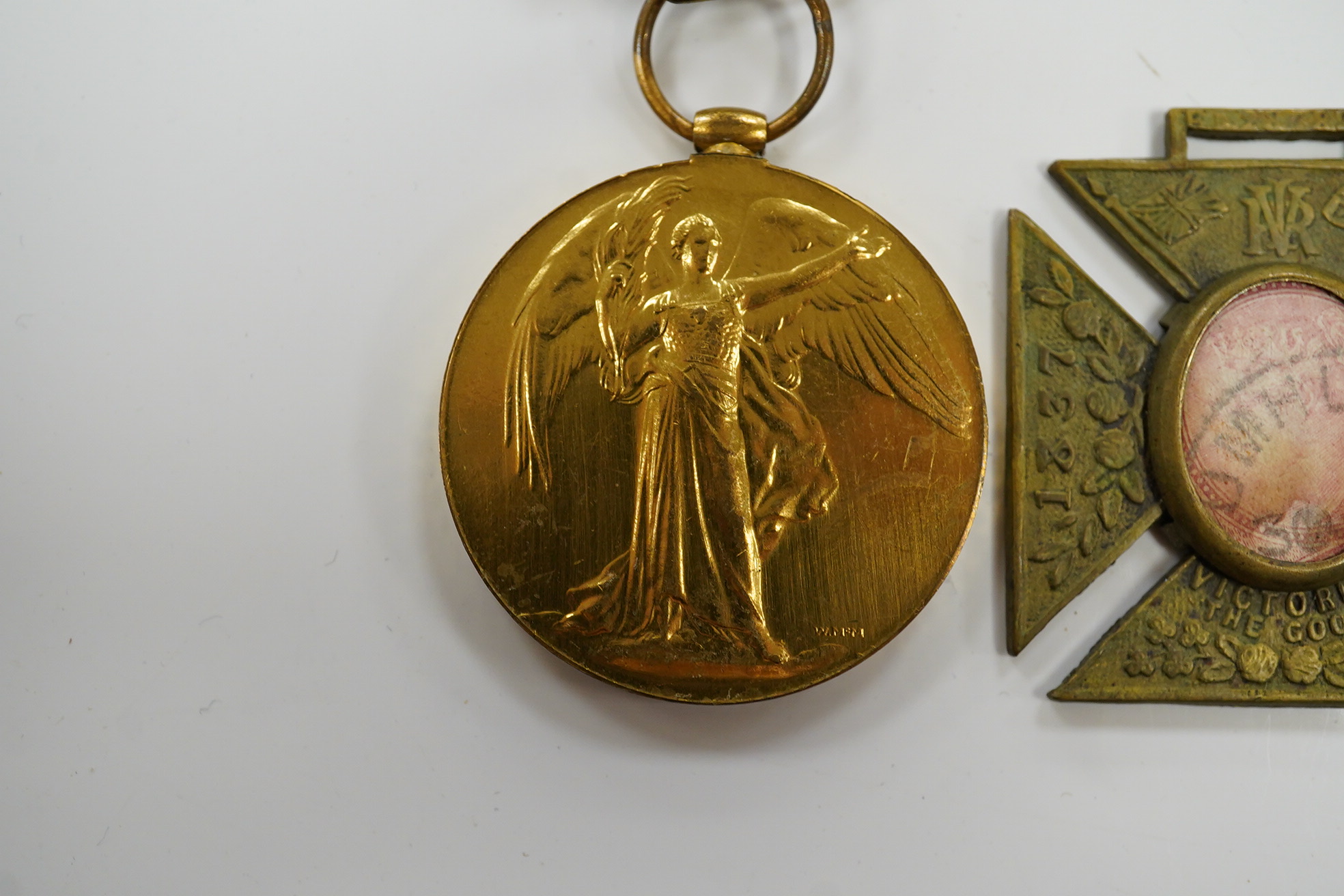 A First World War middle group awarded to A. SJT. E.E. Bogardis 24-CAN. INF. comprising of a medal pair and an 1897 Diamond Jubilee medal for Queen Victoria. Condition - poor to fair